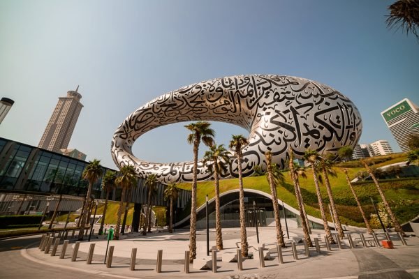 DUBAI/United Arab Emirates-8/11/2021 - Museum of The Future New Attraction  in Dubai downtown built for EXPO 2020, Amazing Modern Architecture Design of building with Arabic poetry on its exterior